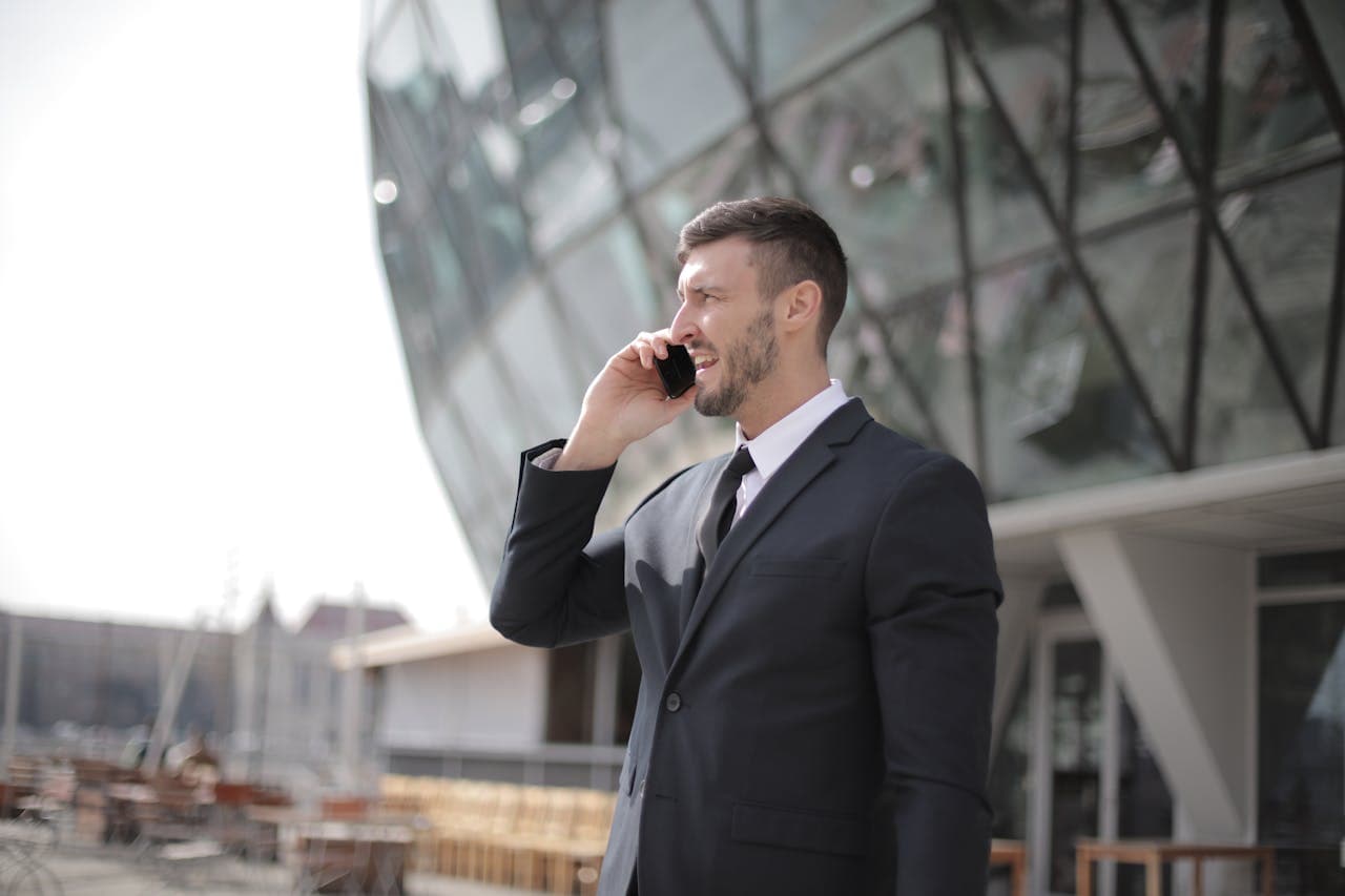 Person smiling while using a smartphone